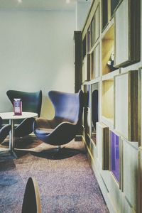 Close-up of chairs in row