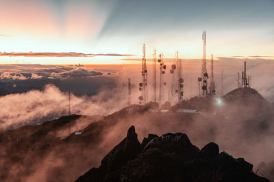 Scenic view of mountains against sky during sunset