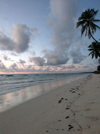 Scenic view of sea against sky at sunset