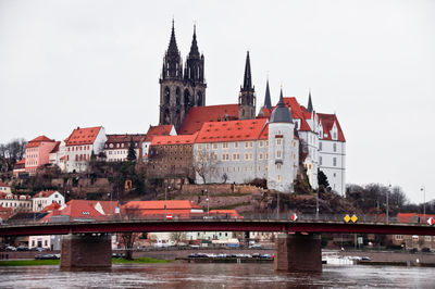 View of bridge over river in city