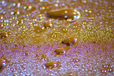 Full frame shot of water drops on leaf