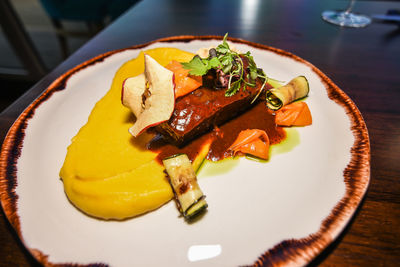 Close-up of food in plate on table