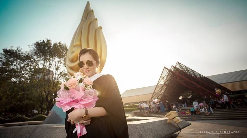 lifestyles, flower, leisure activity, built structure, architecture, building exterior, childhood, girls, city, person, casual clothing, street, clear sky, pink color, incidental people, tree, elementary age