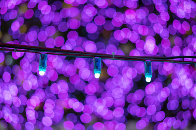 Defocused image of illuminated lights at night