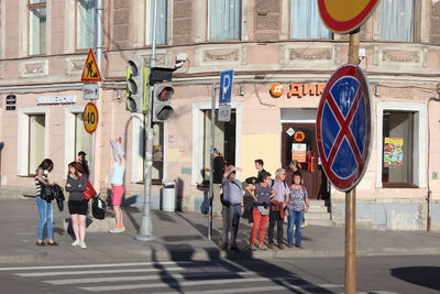 People on street in city