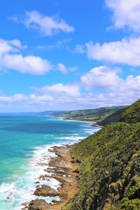 Scenic view of sea against blue sky