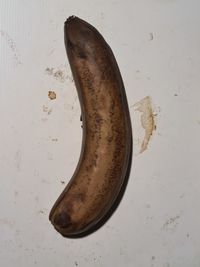 High angle view of banana against white background