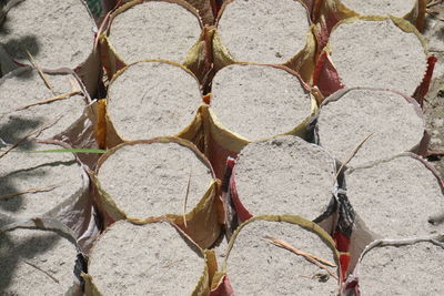 Soil fertilizer in white plastic bags on nursery for tree plantation