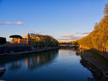 Bridge over river against clear sky