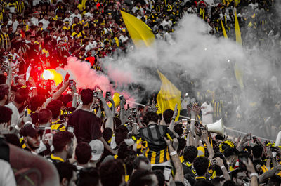 Group of people on soccer field