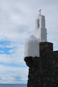 Low angle view of lighthouse against clear sky