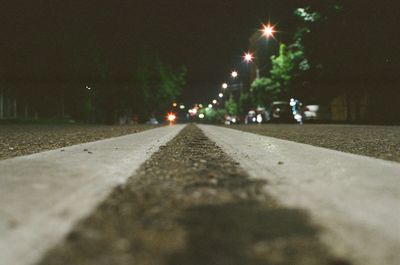 Street lights on road at night