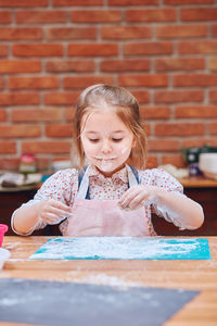 Portrait of a smiling girl with ice cream