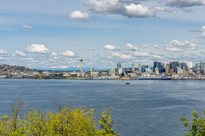 Cascade mountain can be seen behind the seattle skyline in washington state.