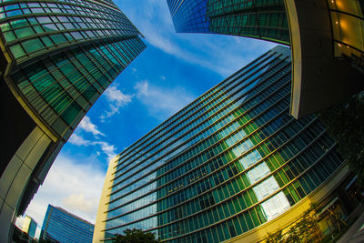 Low angle view of modern buildings against sky