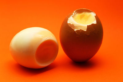 Close-up of orange eggs on table