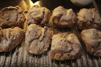 Freshly baked mini christmas stollen on a lattice