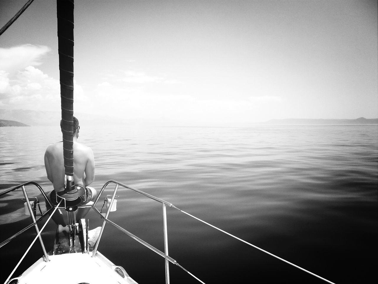 water, sea, sky, transportation, beauty in nature, nautical vessel, nature, tranquility, scenics, tranquil scene, part of, rippled, boat, rope, cropped, day, horizon over water, railing, mode of transport, outdoors