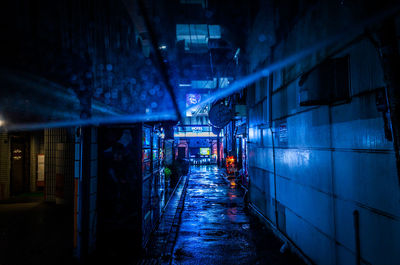 Wet corridor at night