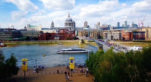 High angle view of millennium bridge over thames river in city