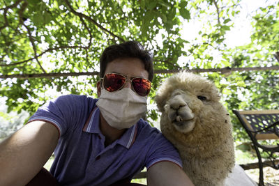 Self portrait with an alpaca 