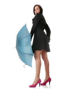 Portrait of woman standing against white background