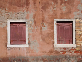 Close-up of windows of old house