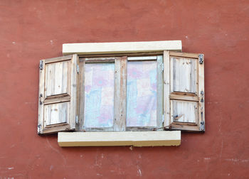 Close-up of old window on wall