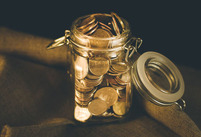 Close-up of coins on table