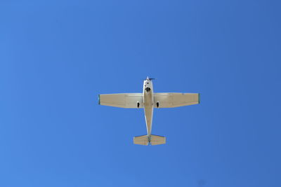 Low angle view of windmill against clear sky