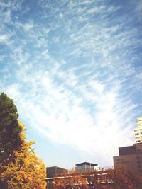 Low angle view of built structure against cloudy sky