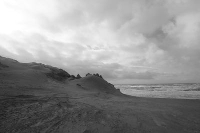 Scenic view of beach against sky