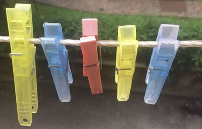 Clothespin hanging on string