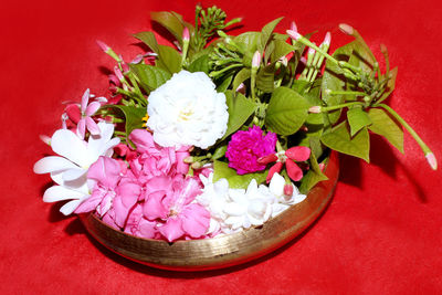 High angle view of pink roses on table