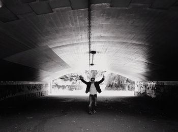 Full length of man standing in corridor