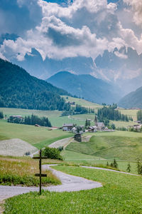 Scenic view of landscape and mountains against sky