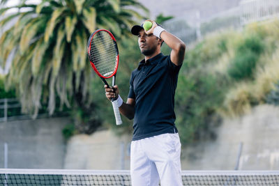 Young man playing tennis