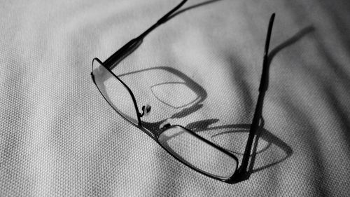 Close-up of eyeglasses on napkin