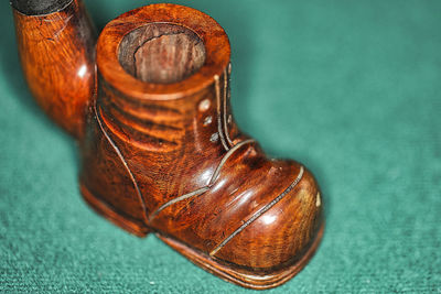 Close-up of wooden shoe in floor