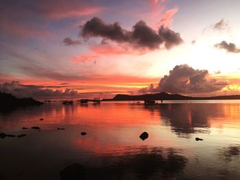 Scenic view of lake against sky during sunset