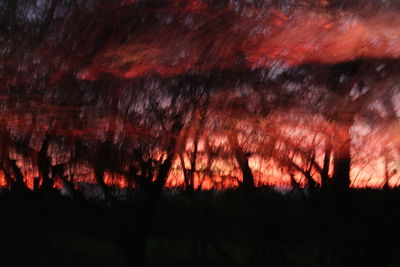 Scenic view of landscape at sunset