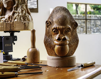 Orangutan head wood sculpture carved by hand