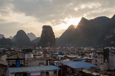 High angle view of townscape against sky during sunset