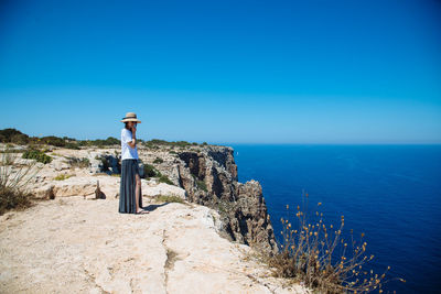 Scenic view of calm sea against clear sky