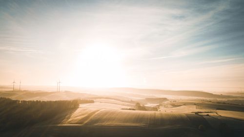 Scenic view of landscape against sky during sunset