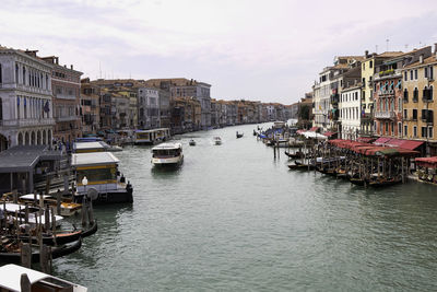 View of the grand canal from rialto bridge - classic beautiful view with boats and gondolas - venice