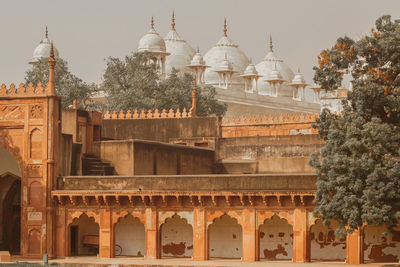 View of historic building with city in background