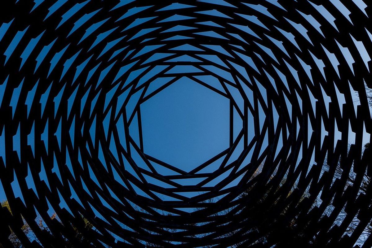 low angle view, pattern, backgrounds, blue, full frame, design, modern, clear sky, built structure, directly below, no people, abstract, architecture, repetition, day, tall - high, outdoors, ceiling, sky, glass - material