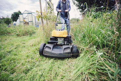 Man mowing lawn