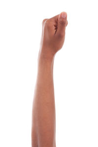 Close-up of human hand against white background